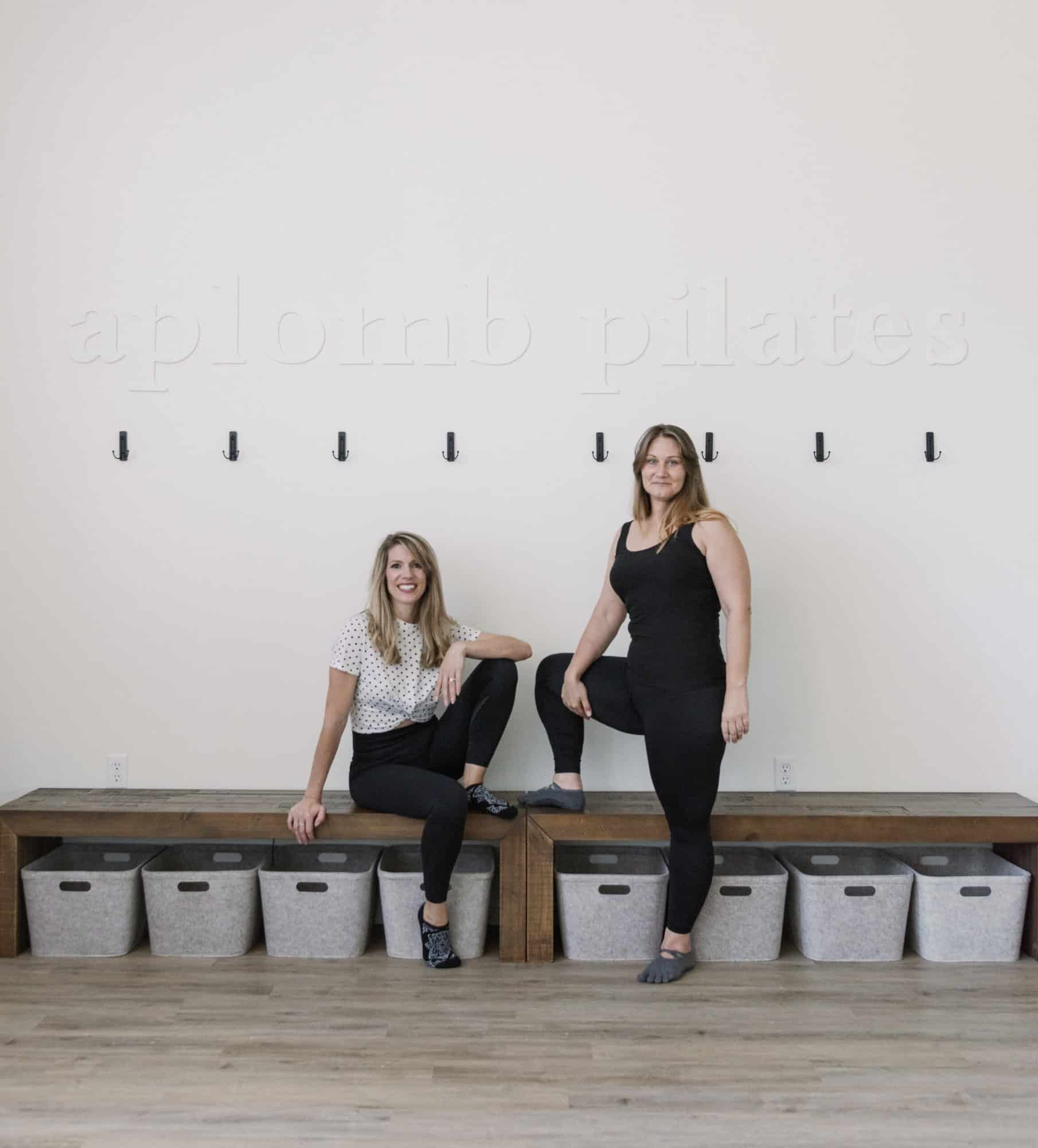 A photo of the Apbomb Pilates studio with the two owners.