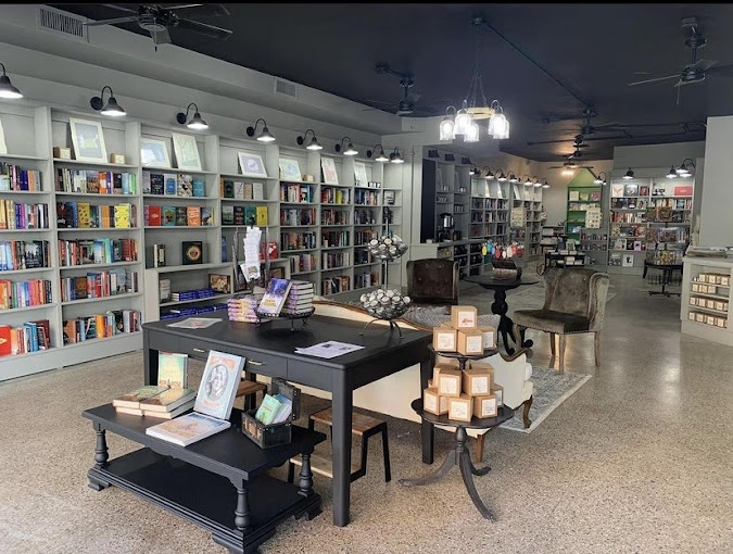 A photo of tables and bookshelves at The Little Green Bookstore.