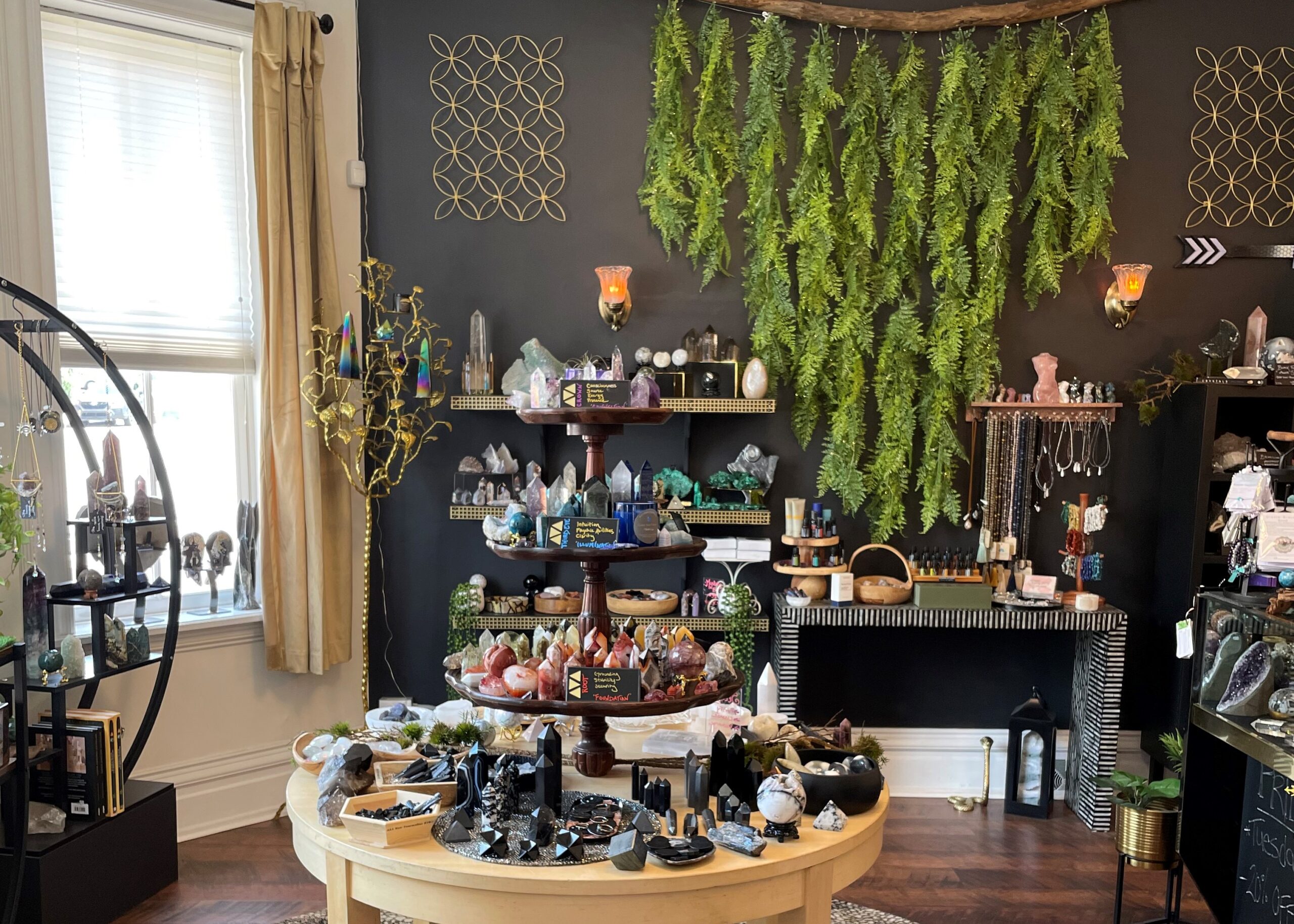 A photo of crystals and jewelry at Modern Alchemy House of Crystals.