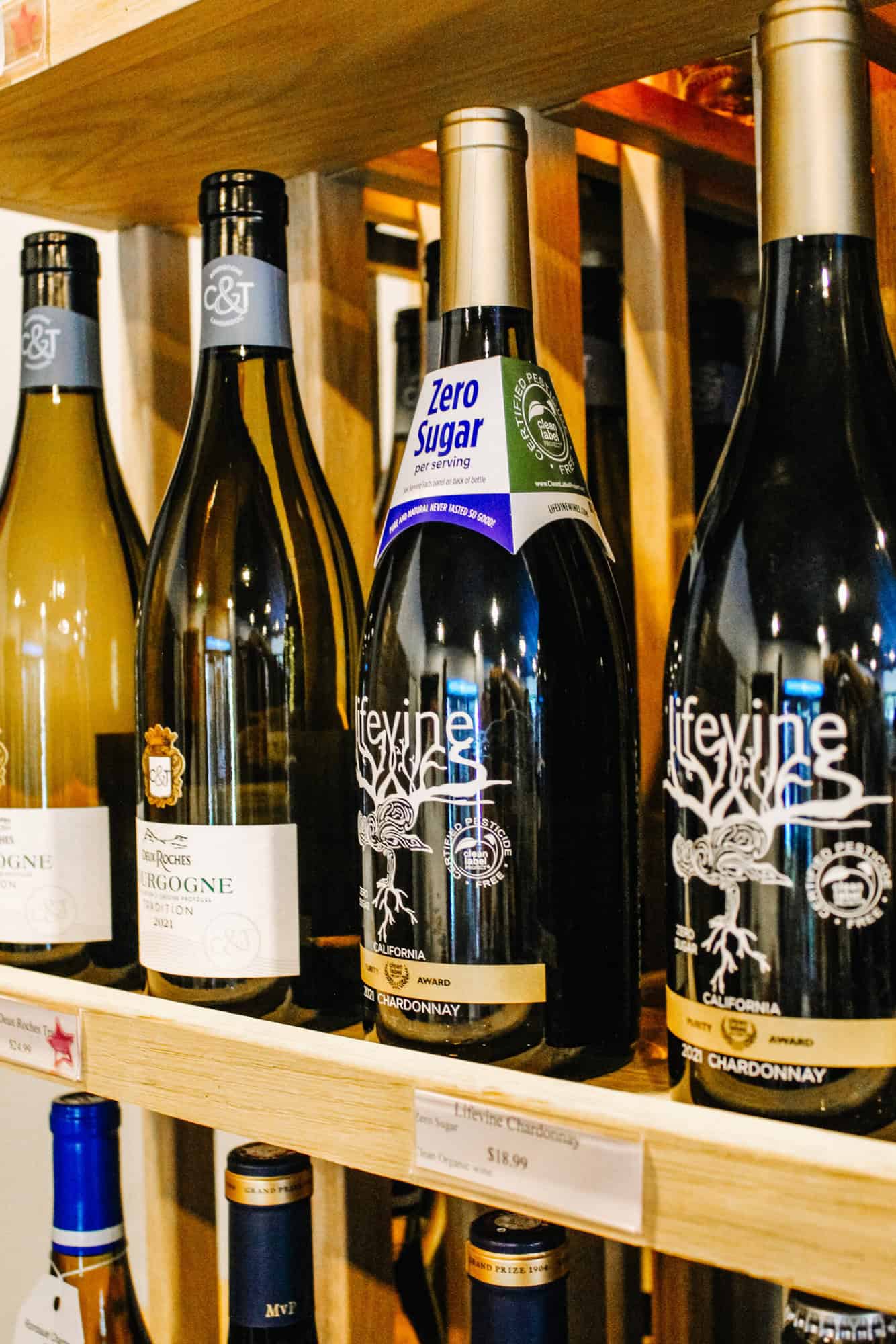 A photo of a shelf of wine at P'Vino. There is a zero sugar wine option.