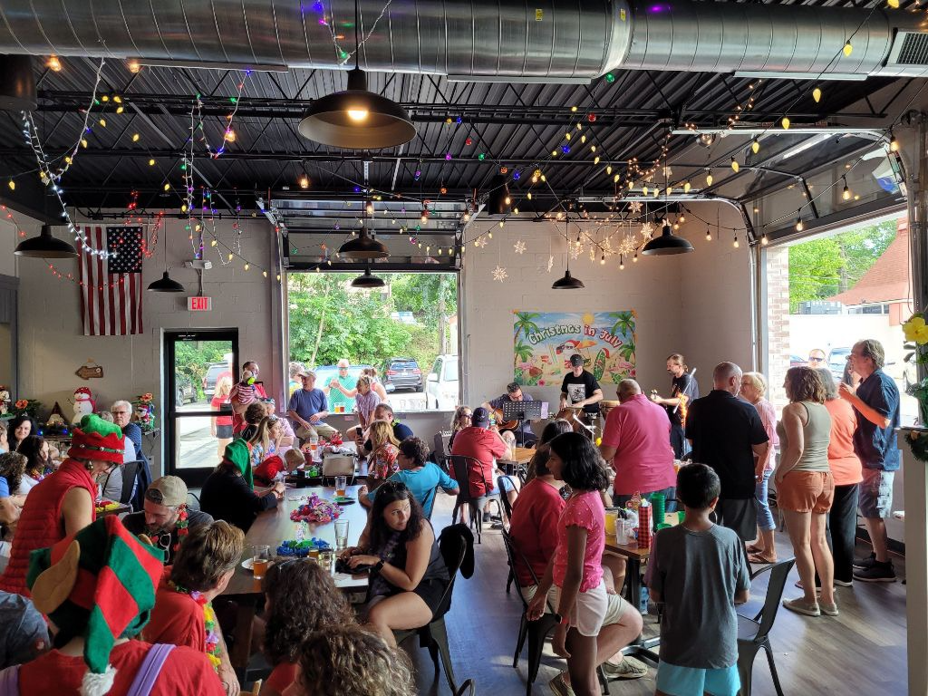 A photo of people celebrating Christmas in July at Acrospire Brewing Co.
