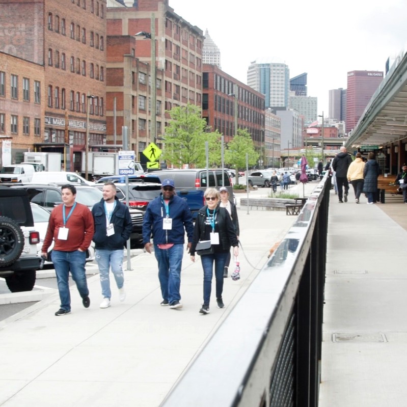 A photo of people walking near the Terminal on their Best Bites Strip District tour.