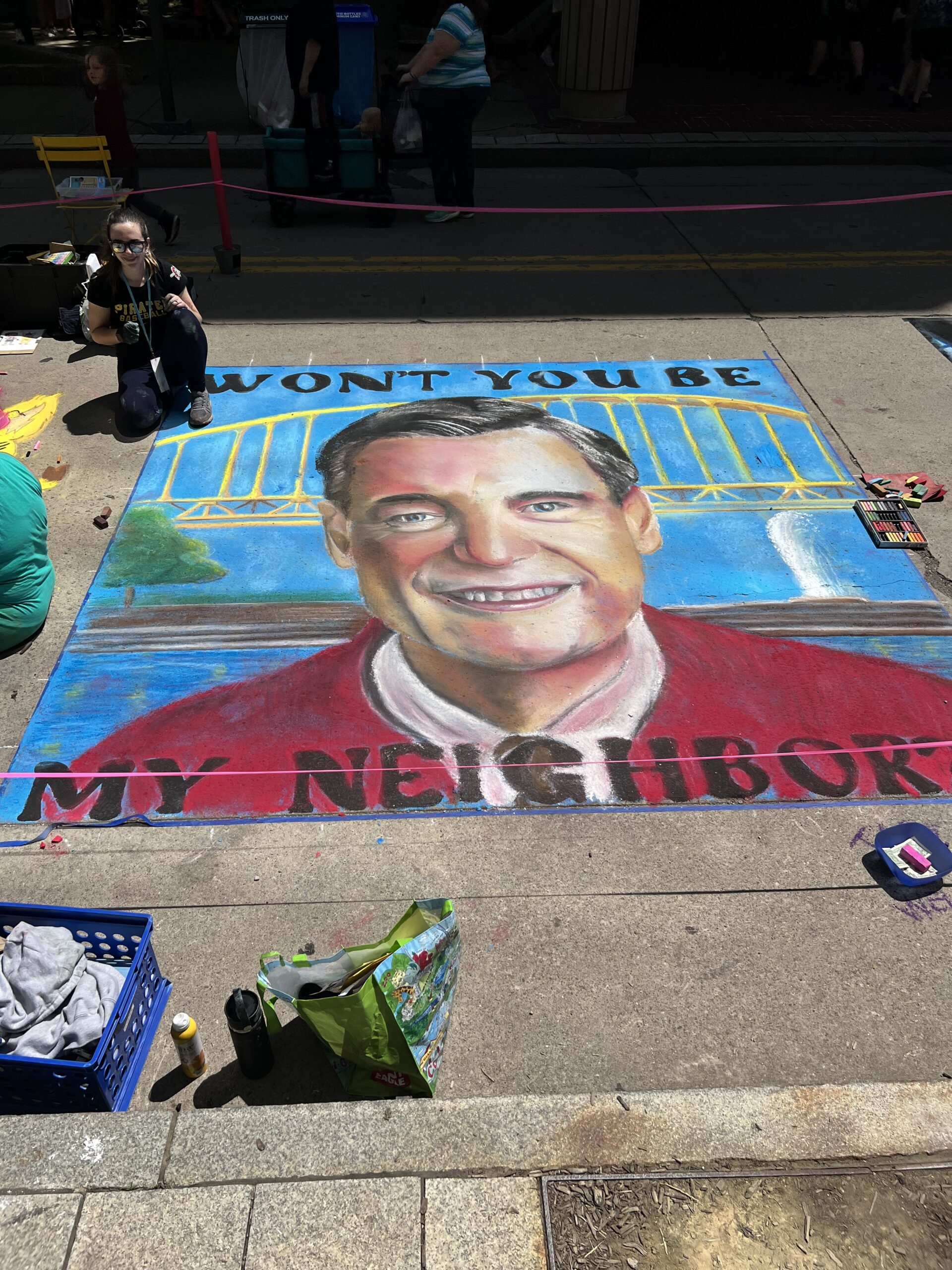 A photo of a Mr. Rogers chalk art portrait done at Riverlife Chalk Fest.