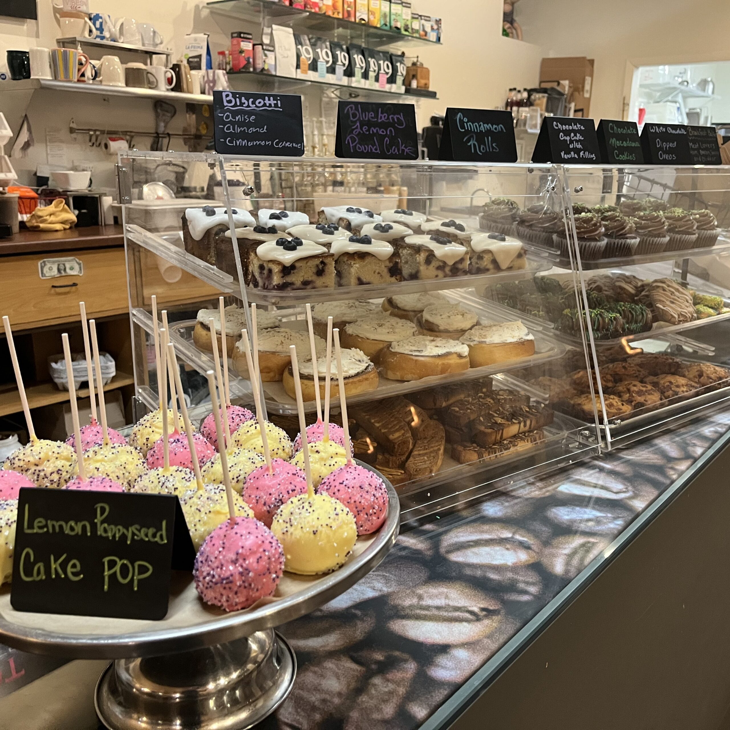 A photo of the inside of Potomac Station Coffeehouse, with cakepops and pastries available to purchase.