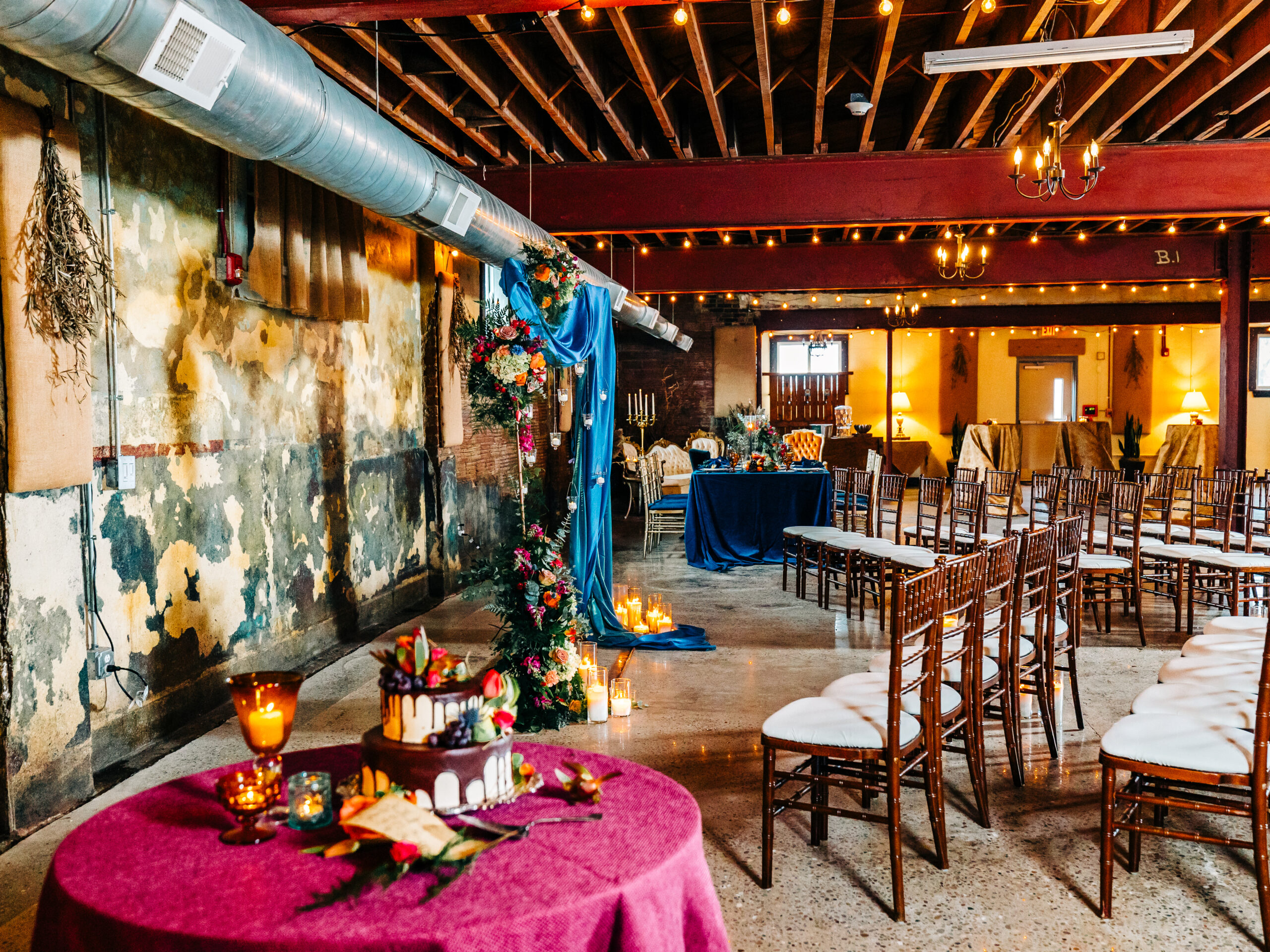 A photo of a colorful floral setup in a well lit area for the ceremony at the WBU Event Venue.