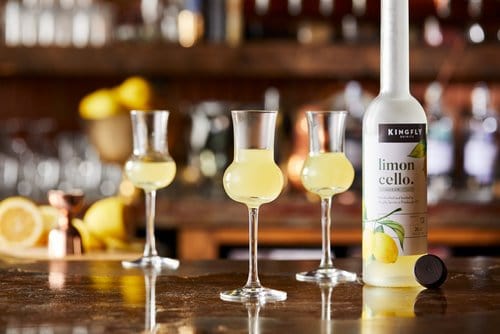 A photo of three glasses filled with Kingfly's limoncello.
