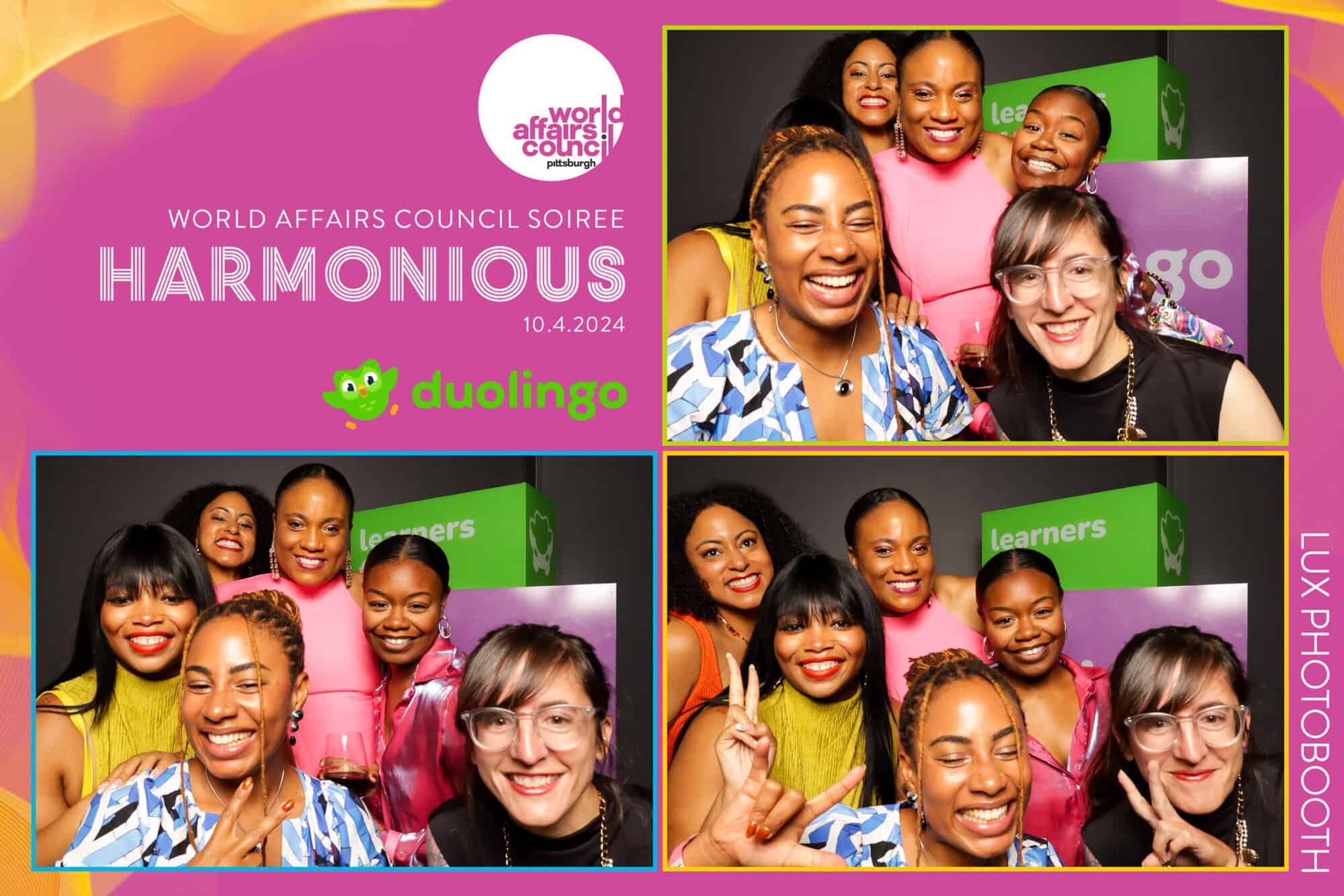 A group of women posing for photo booth photos from the Harmonious soiree.