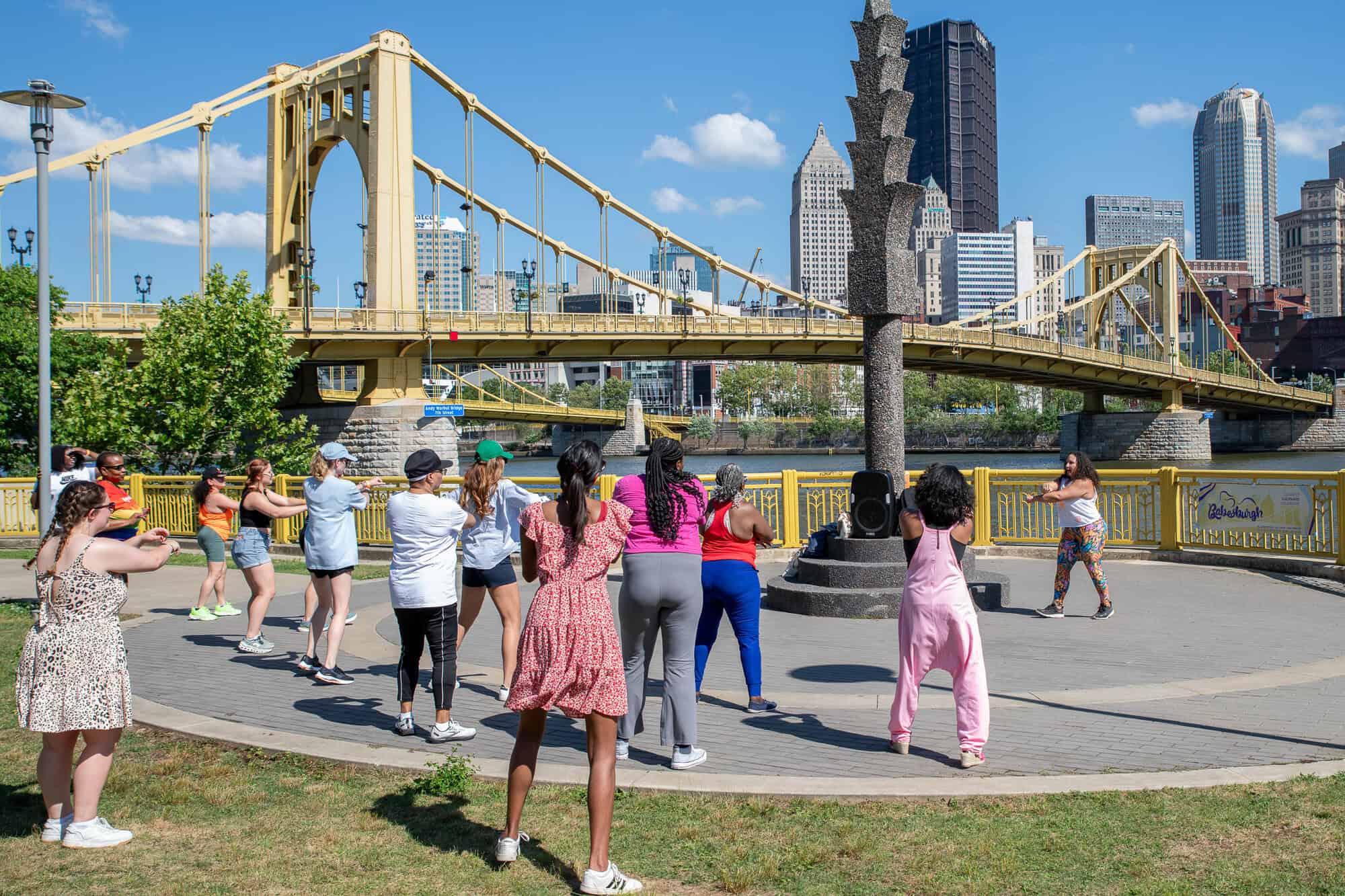 A photo of women exercising at Allegheny Landing at Babesburgh 2024.
