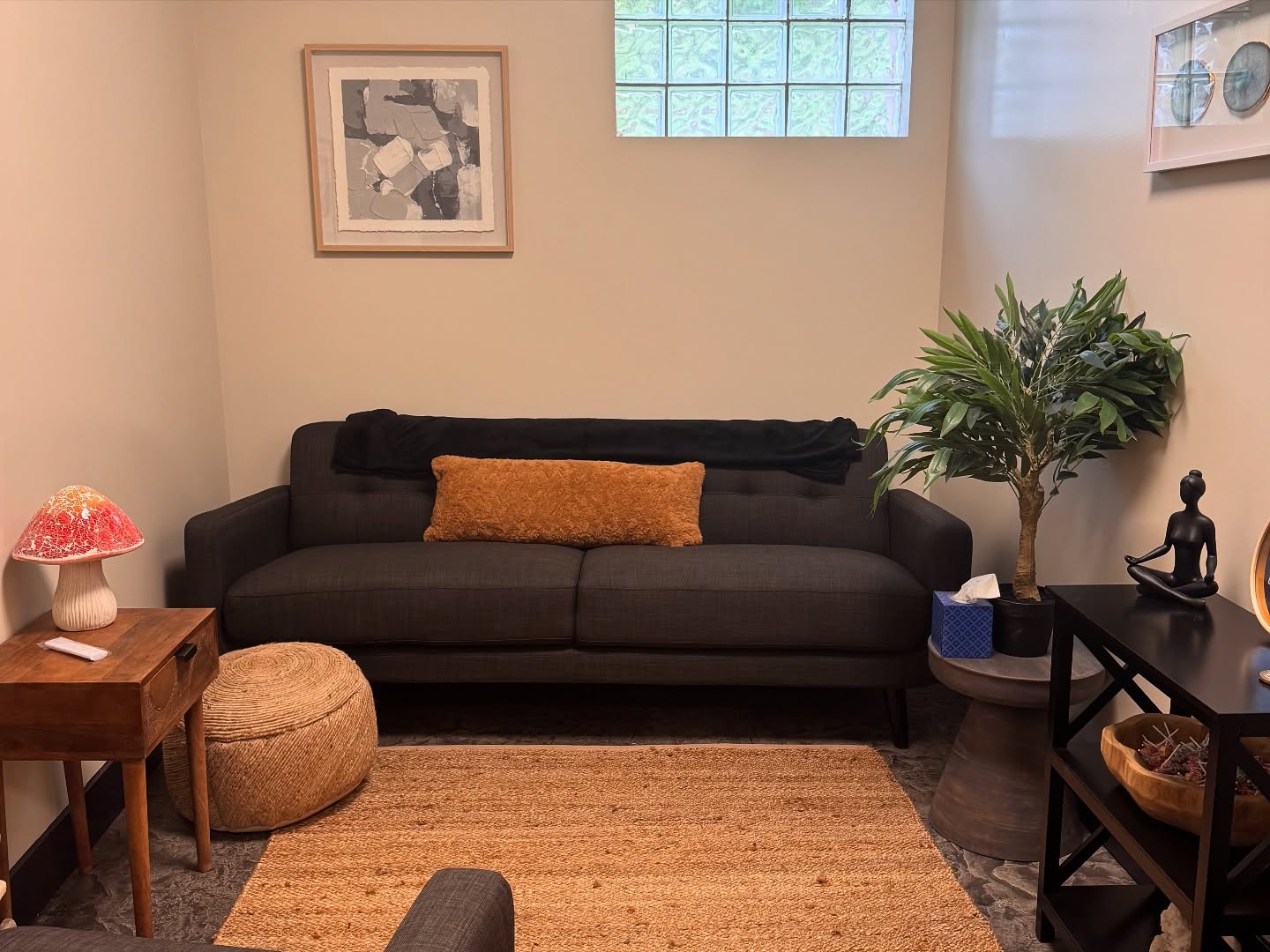 A photo of a couch area at Elements Counseling and Wellness Spa.