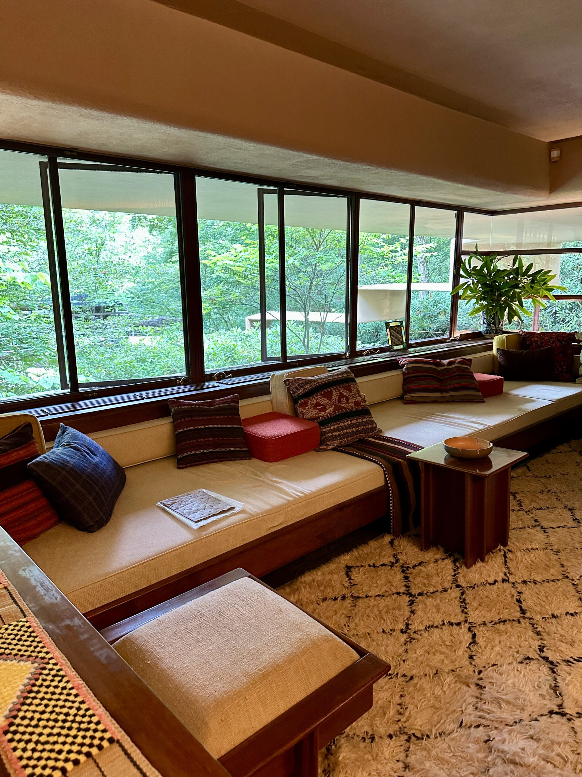 A photo of the windows open in the living area at Fallingwater.