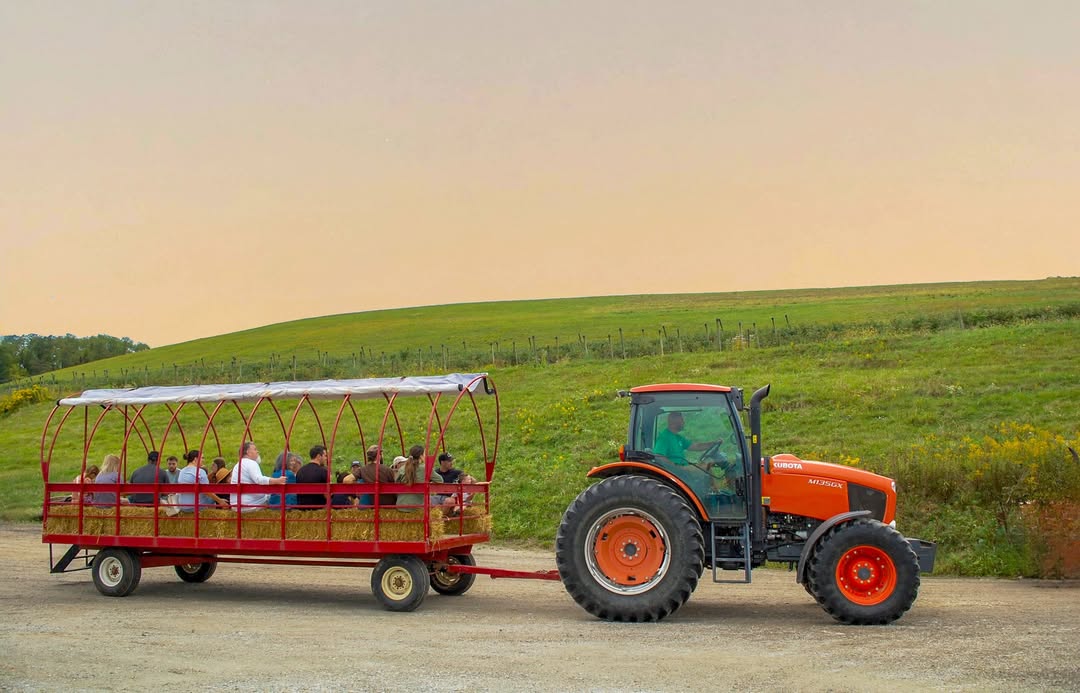 A photo of people on a hay ride at Trax Farms.