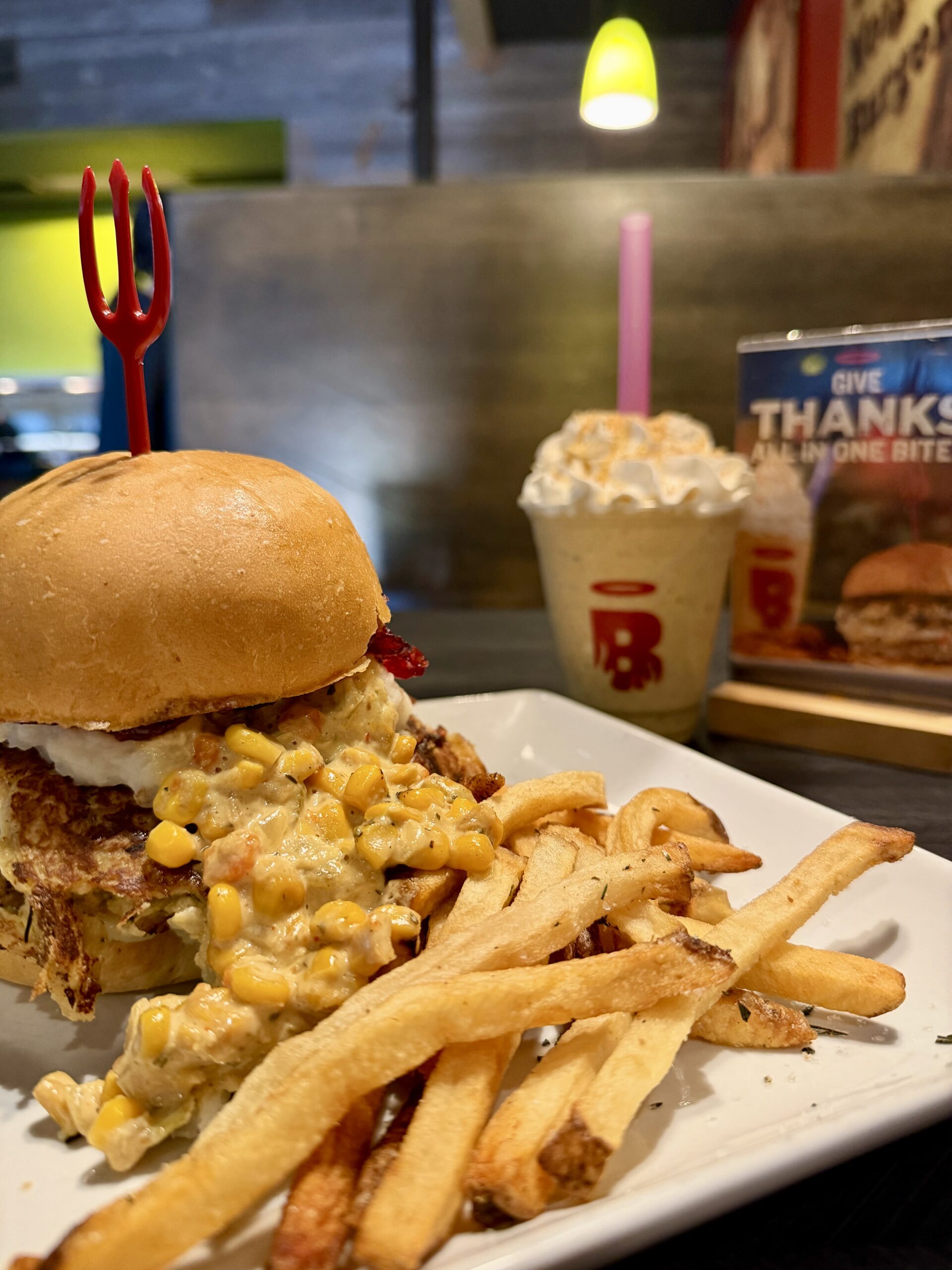 A photo of Burgatory's Thanksgiving Burger and Pumpkin Pie Shake.