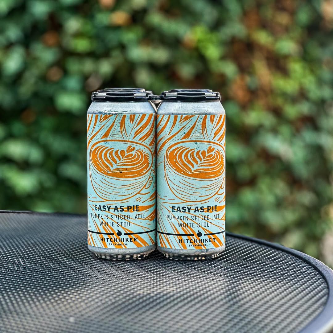 A photo of Easy as Pie beer cans from Hitchhiker Brewing, a great beer to pair with Thanksgiving dinner.