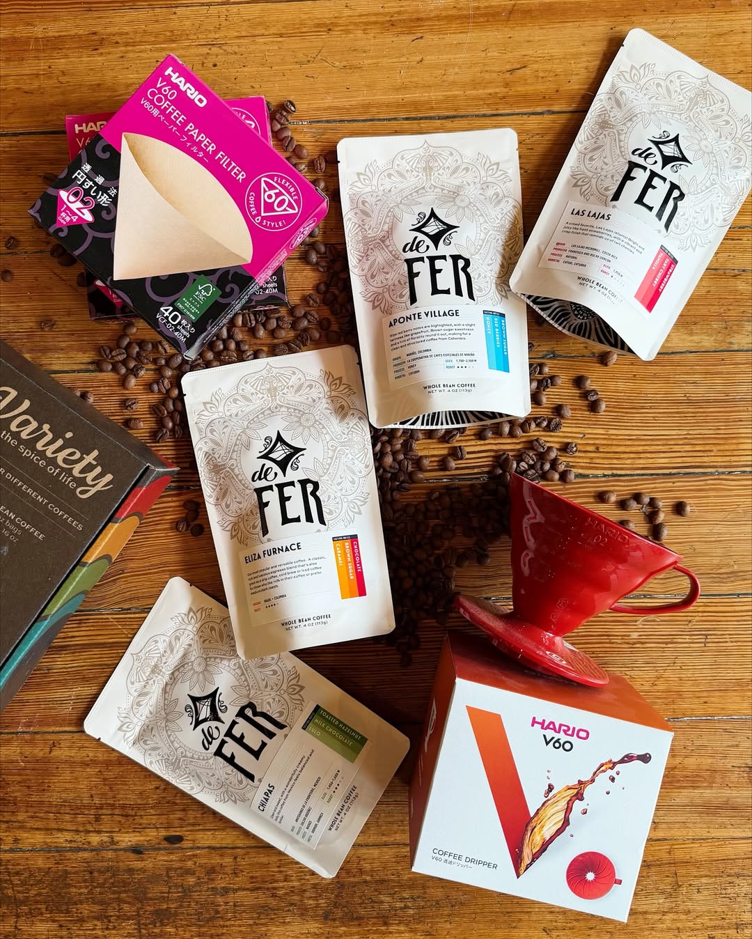 A photo of different coffees and teas for sale at De Fer Coffee & Tea.